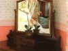 classic-dark-wood-furniture-enhanced-by-soft-pink-wallpaper