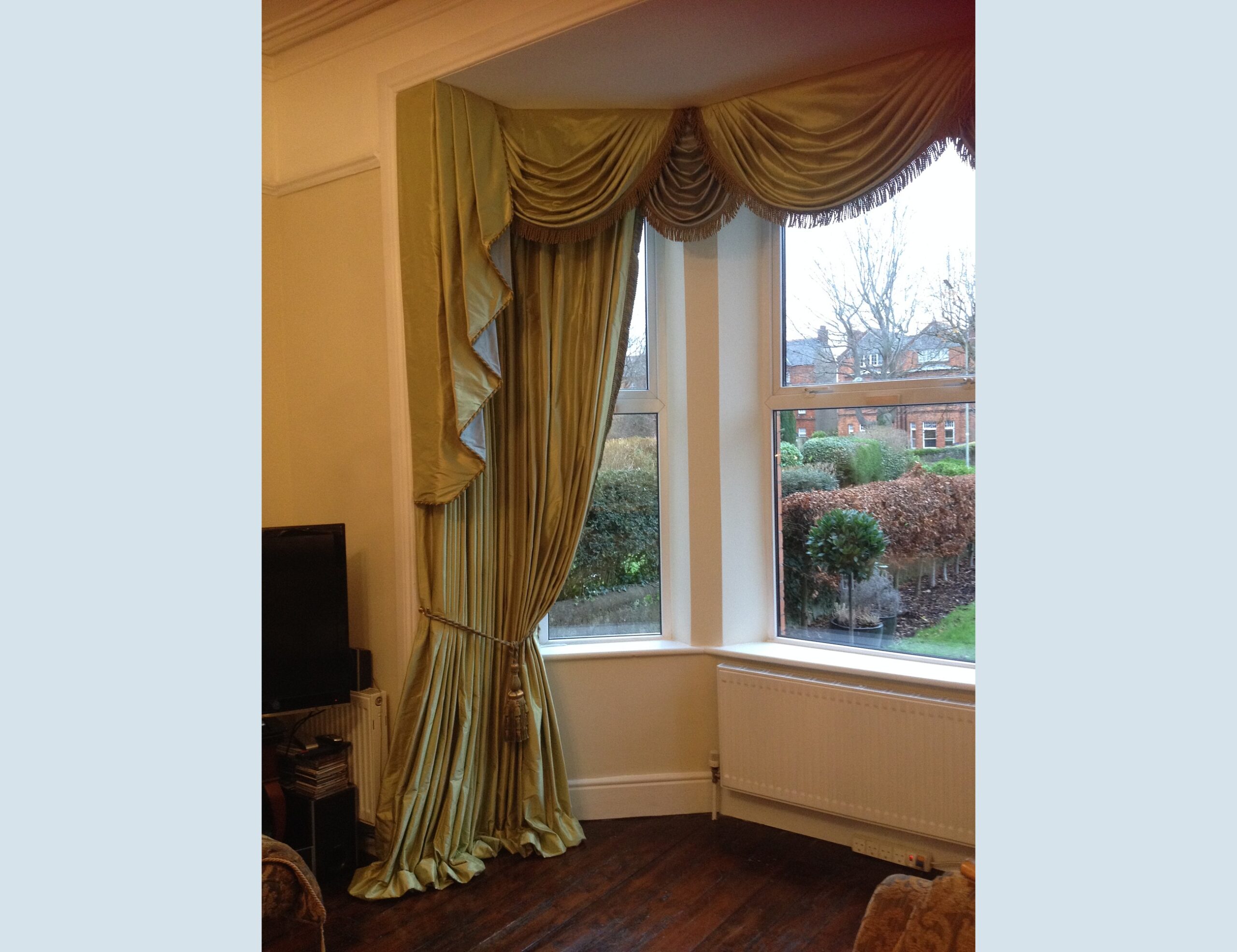 fringed-gold-curtains